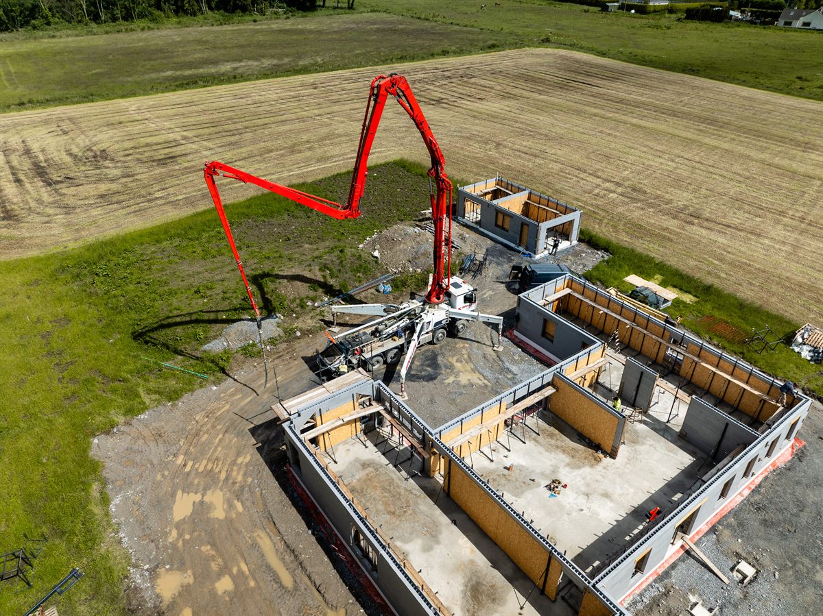 Aerial view of the Spollen boom pump reaching across a Ballinasloe house build