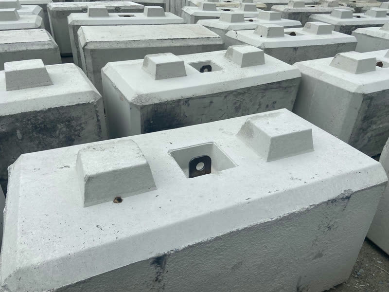 Spollen interlocking concrete blocks stacked in the Glasson yard