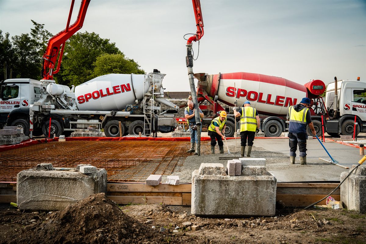 Spollen crew pouring with boom pump on the Moate slab