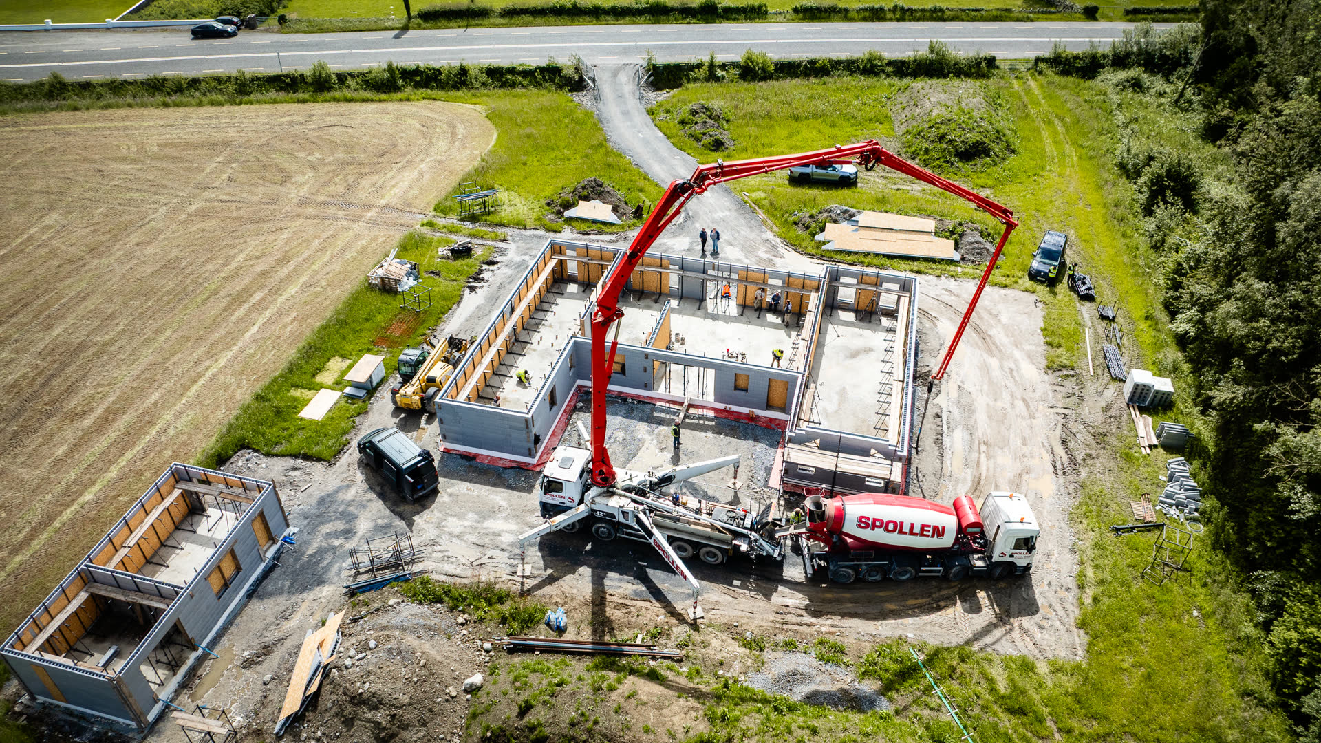 A Spollen mixer feeding the boom pump on a house build